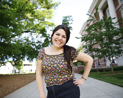 Janessa, a female student, stands outside a building at Central Piedmont Community College in Charlotte, N.C.